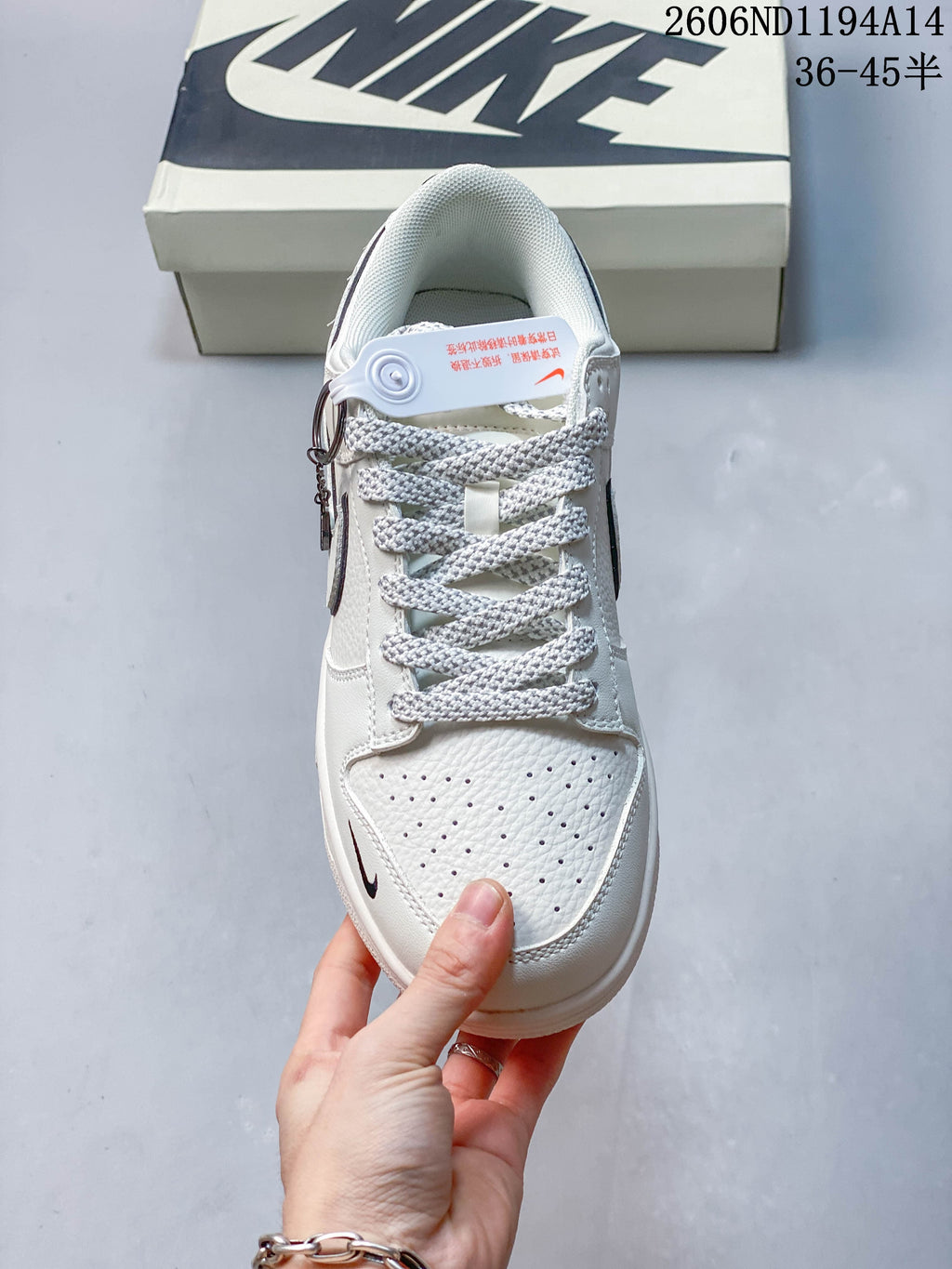 Top view showing perforated toe panel and textured laces