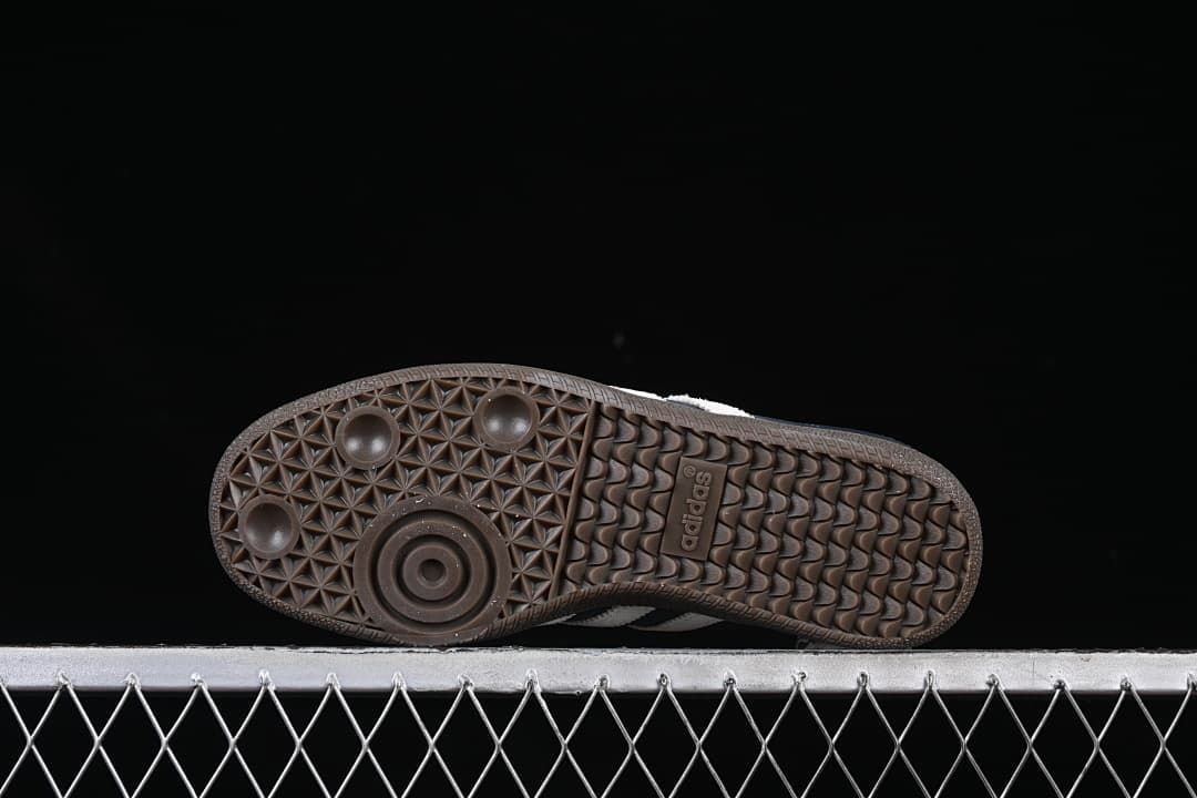 Underside showing the dark outsole tread pattern