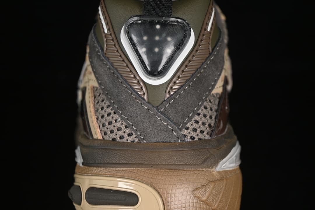 Rear view showing layered heel panels and sculpted sole