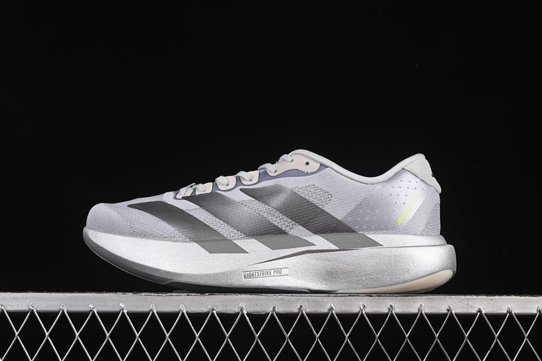 Side profile of the Adizero Evo SL running shoe in gray with dark stripes.