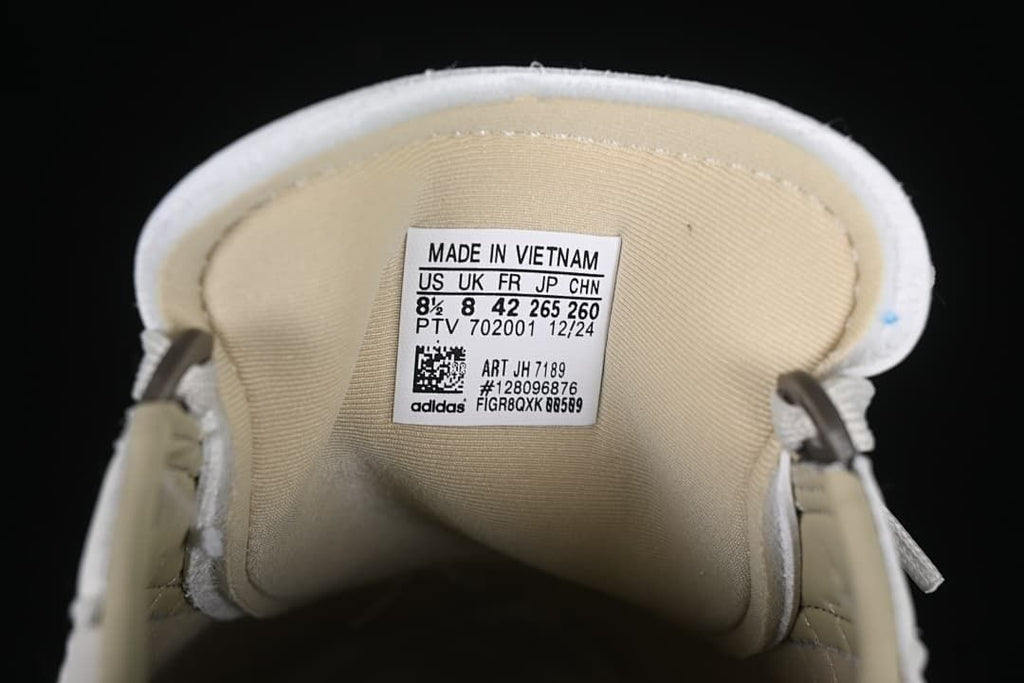 Tongue label showing size conversions and style code JH7189