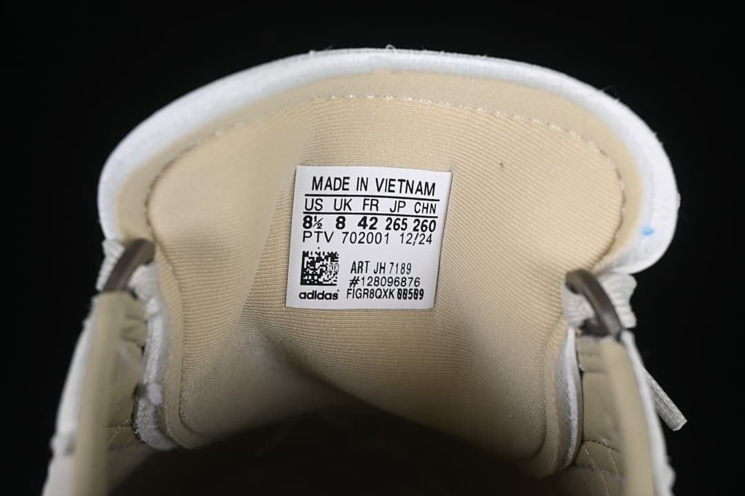Tongue label showing size conversions and style code JH7189