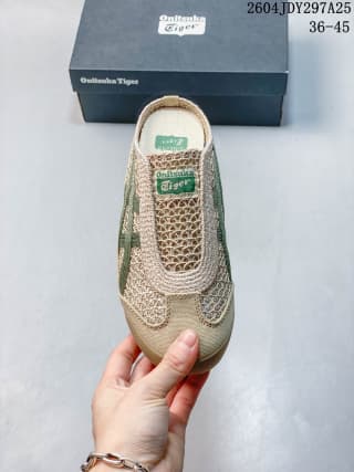 Top view of a beige and green Onitsuka Tiger Mexico 66 Sabot sneaker beside its shoebox.