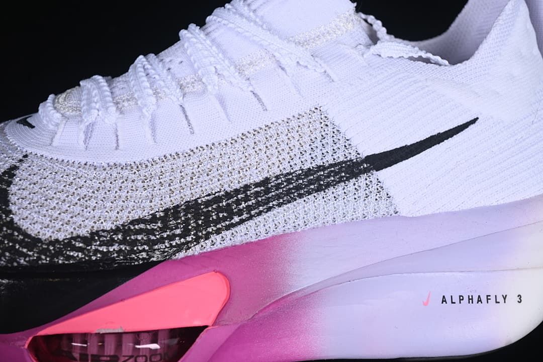 Close-up of the knit-look upper, black Swoosh, and Alphafly 3 midsole marking