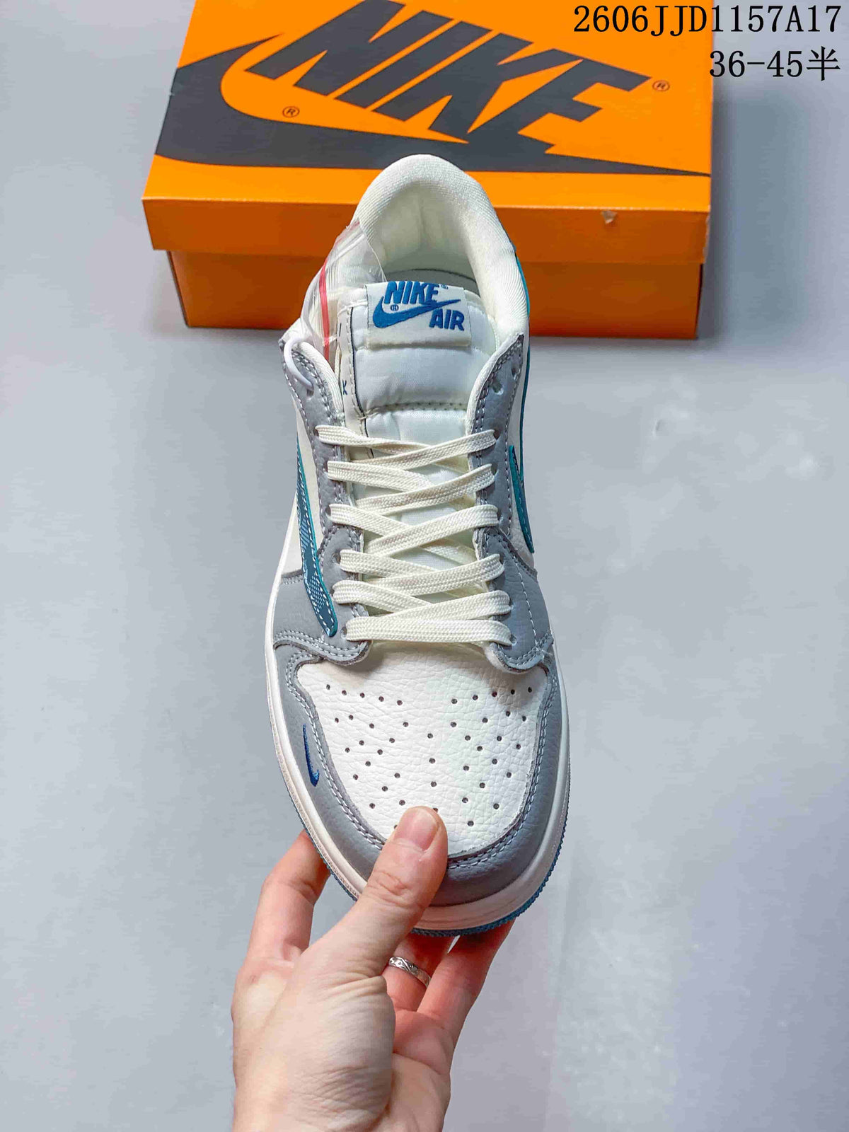 Front view showing the perforated toe, white laces and grey overlays.