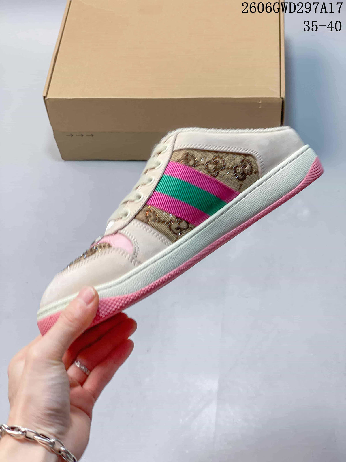 Side view of a beige and brown patterned sneaker with pink and green stripe details.