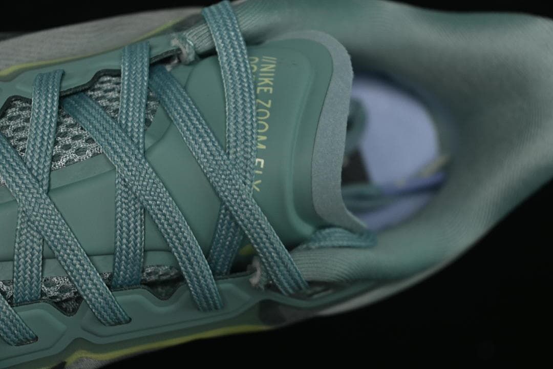 Close-up of tongue, laces, and shoe opening
