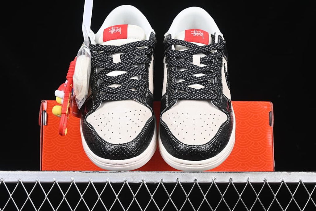 Front view of the pair showing perforated toes and black laces