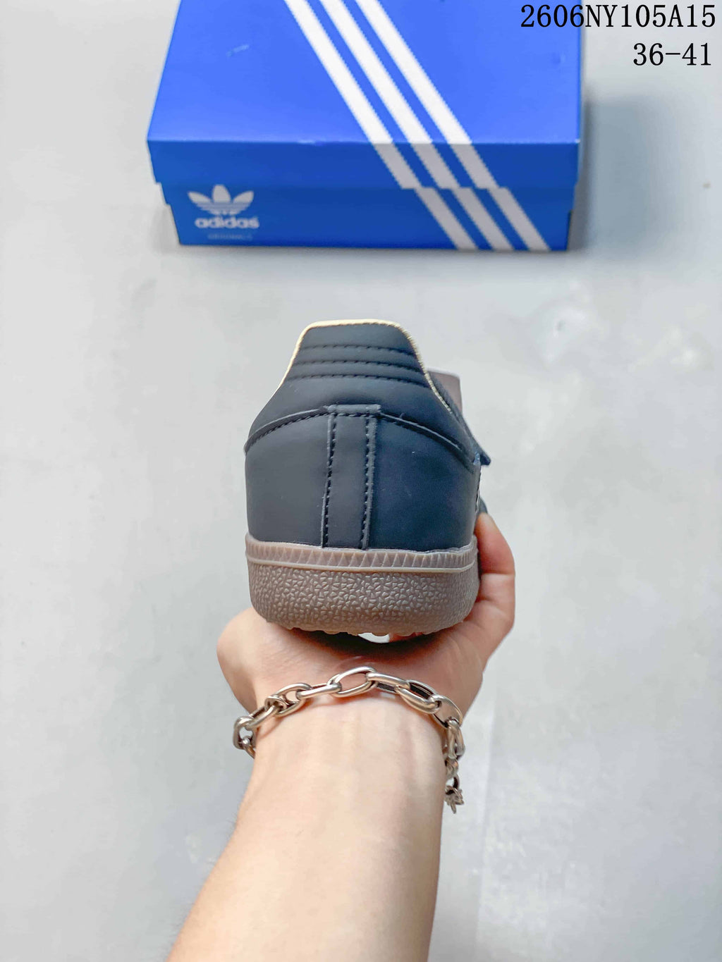Rear view of the dark blue Samba Jane shoe showing the heel and gum-colored sole.