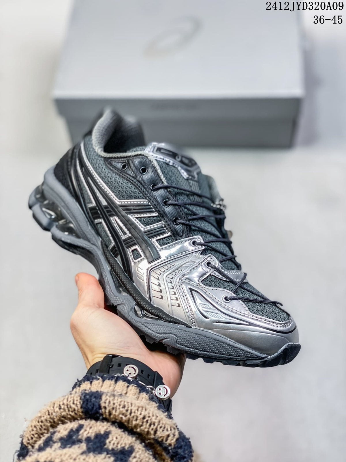 Angled side view of a silver and dark gray ASICS sneaker; image overlay reads 2412JYD320A09 and 36–45.