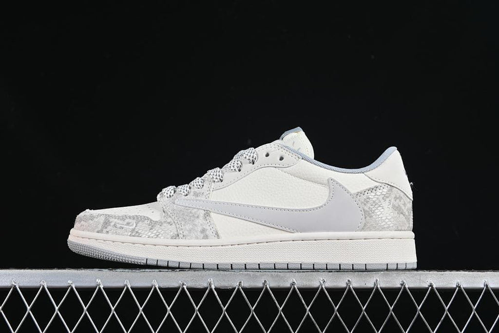 Side view of an off-white and grey low-top sneaker with snake-patterned overlays and a light grey side Swoosh.
