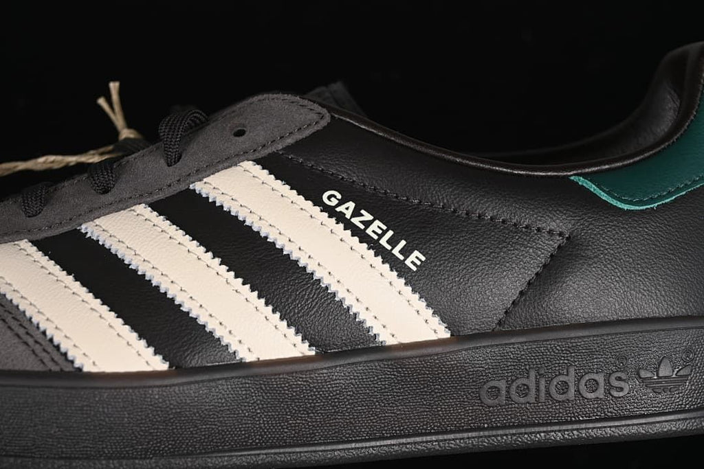 Close-up of the side stripes, Gazelle name, and textured outsole
