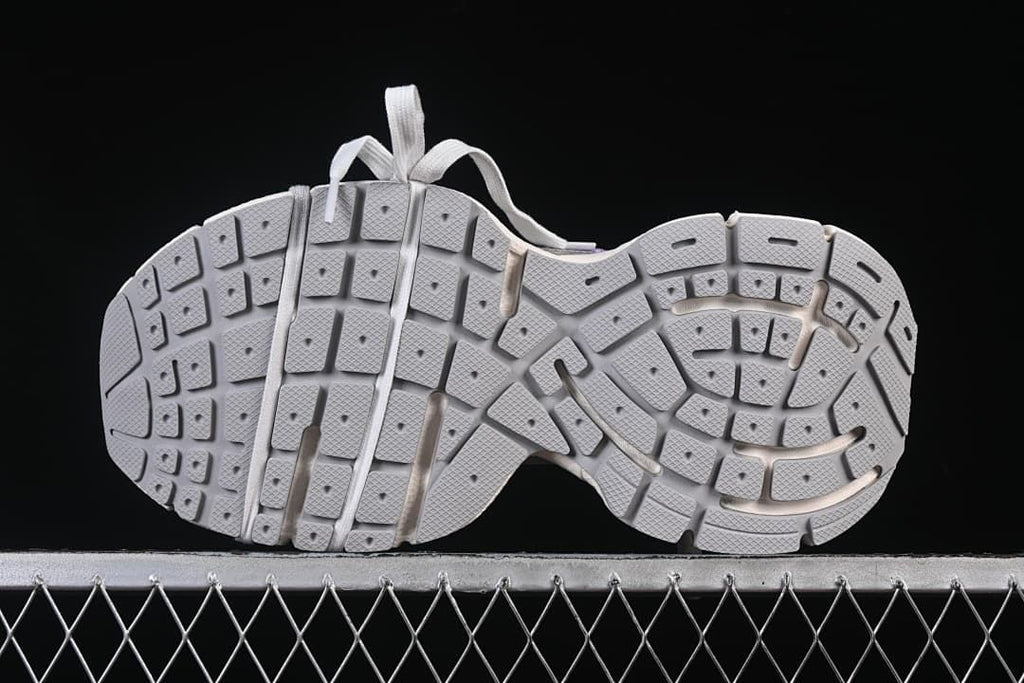 Underside view showing the segmented outsole tread.