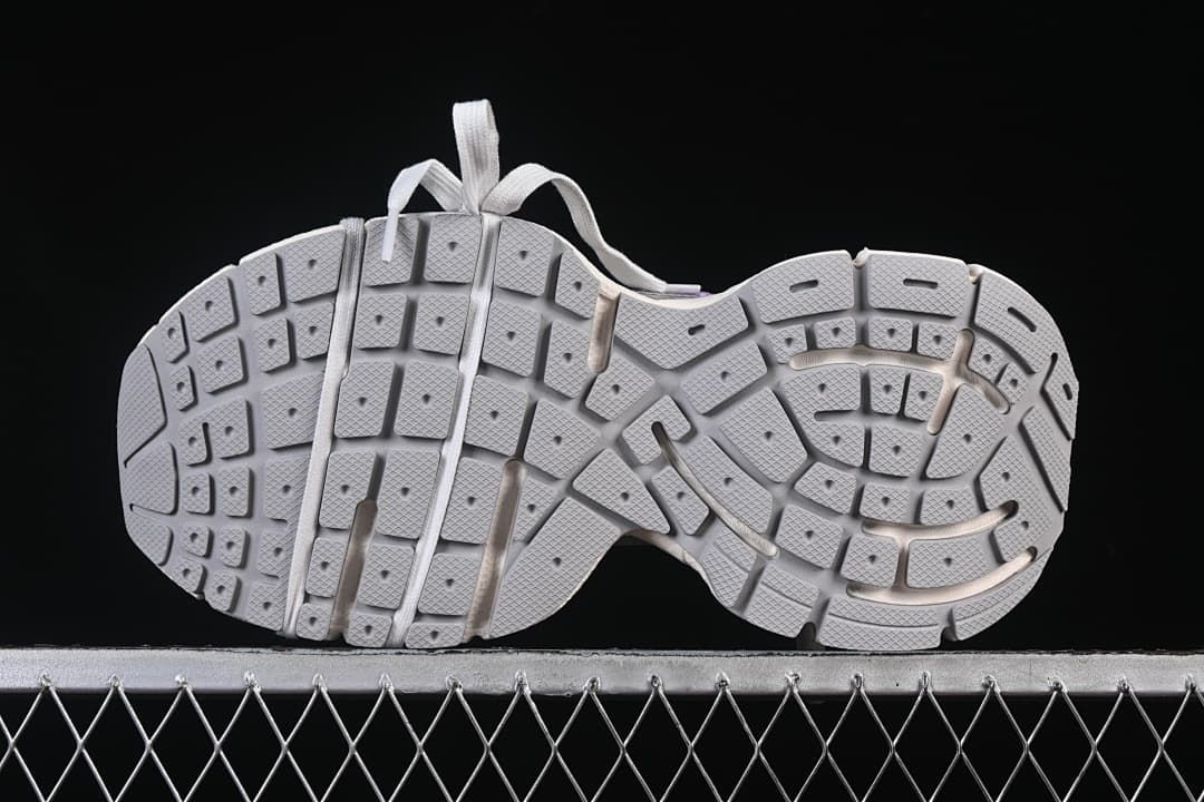Underside view showing the segmented outsole tread.