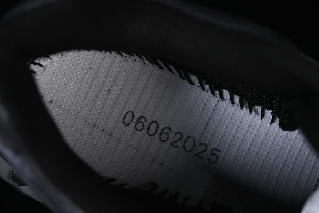 Close-up of the shoe interior with a printed marking