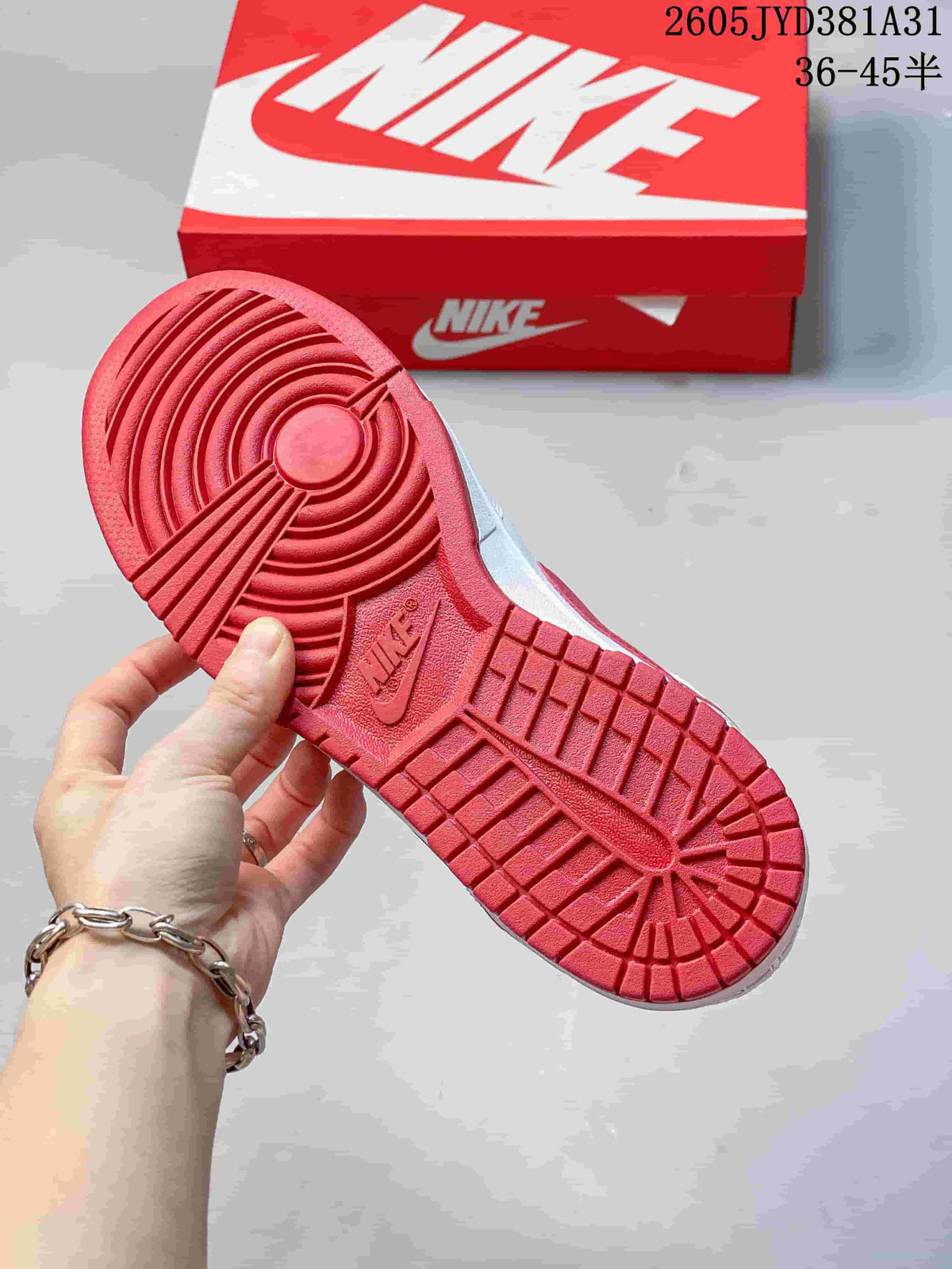 Close-up of the red patterned outsole on a Nike low-top sneaker