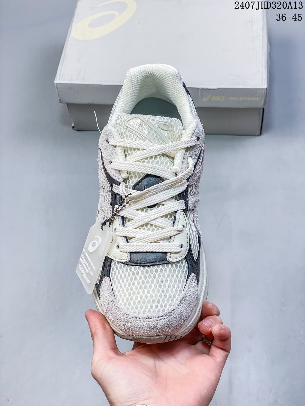 Front view of the mesh-panel sneaker with cream laces