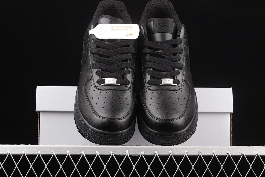 Front view of the pair showing perforated toes and black laces.