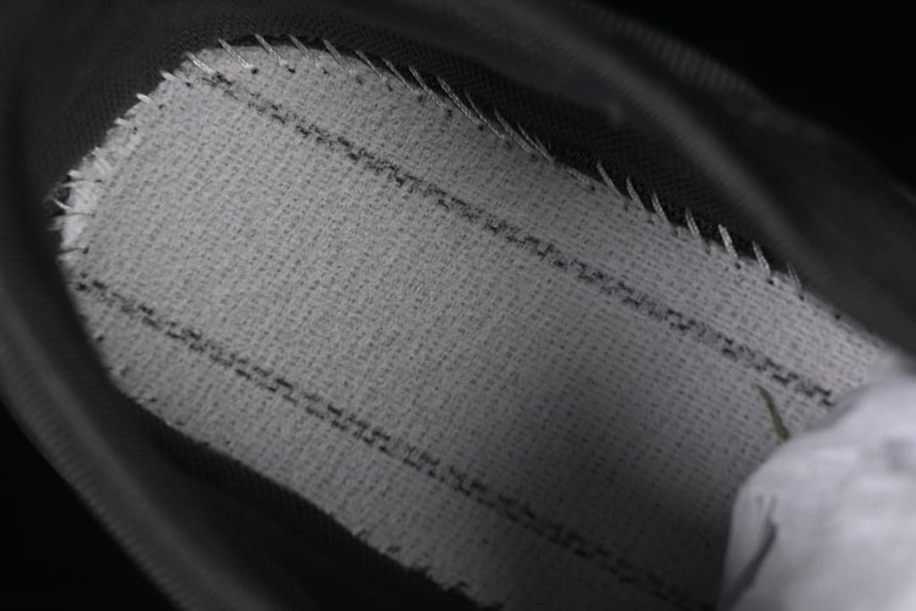 Close-up of the inner shoe lining and stitching
