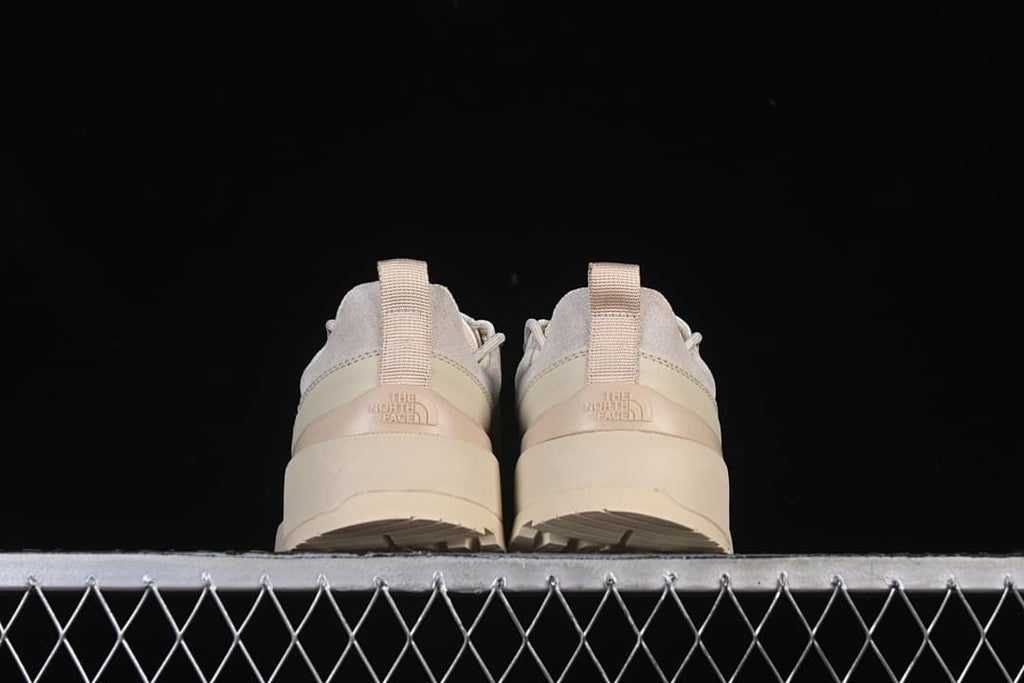 Rear view of both shoes and heel pull tabs
