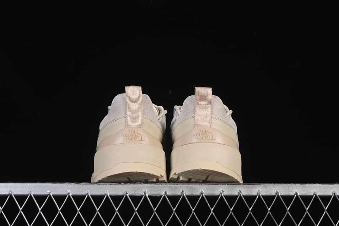 Rear view of both shoes and heel pull tabs