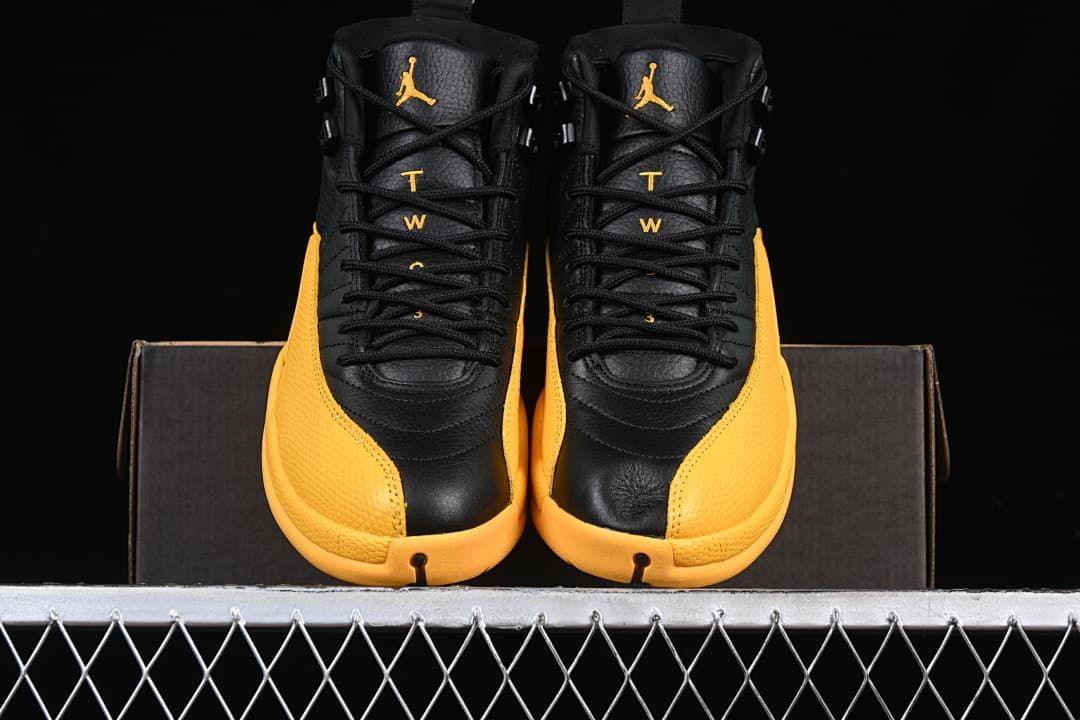 Front view of the pair showing black uppers and gold accents