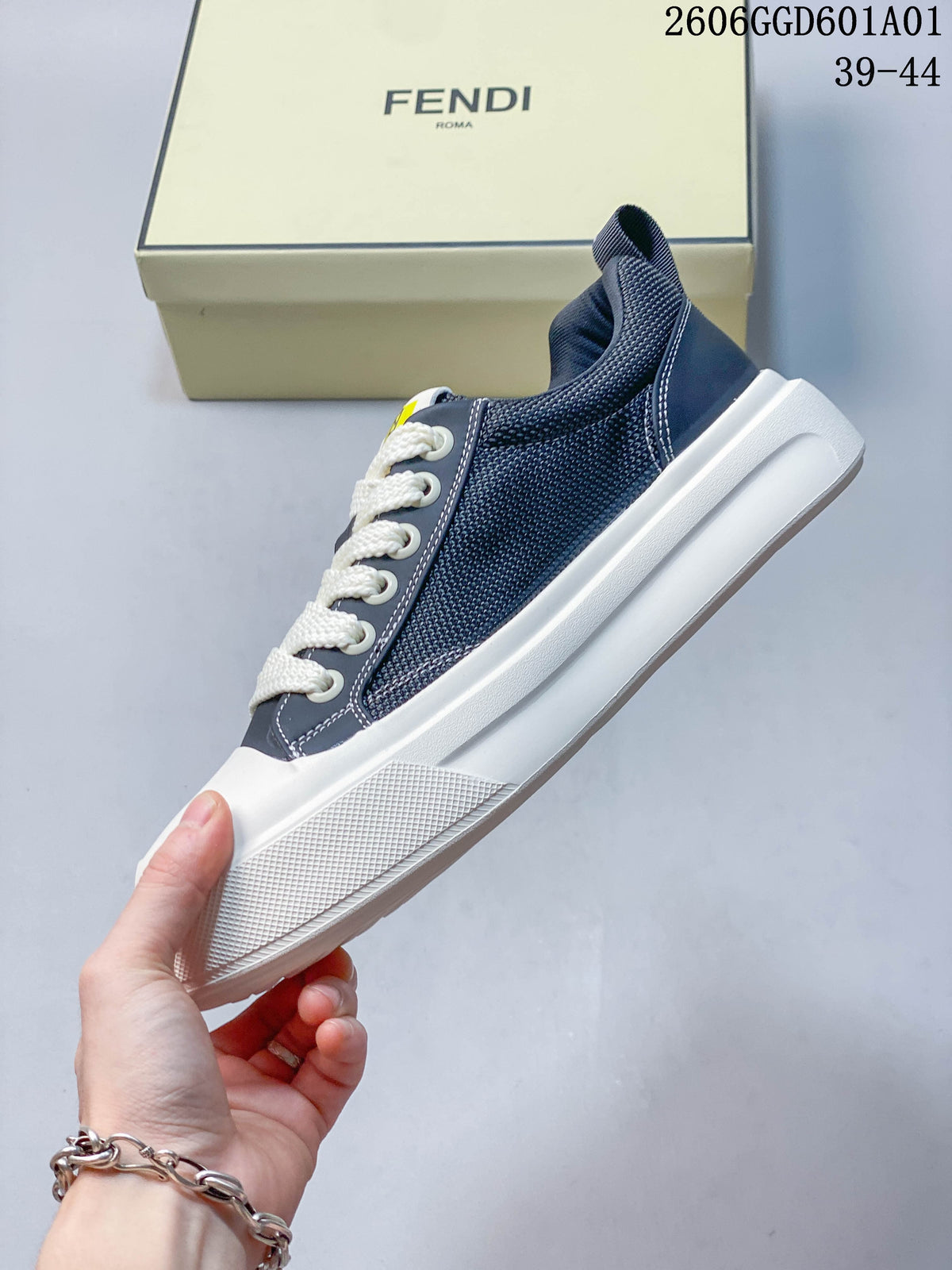Side profile highlighting the textured navy panels, white laces, and broad white sole.