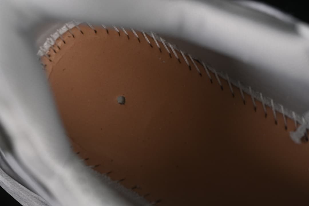 Close-up inside the sneaker showing the footbed and inner construction.