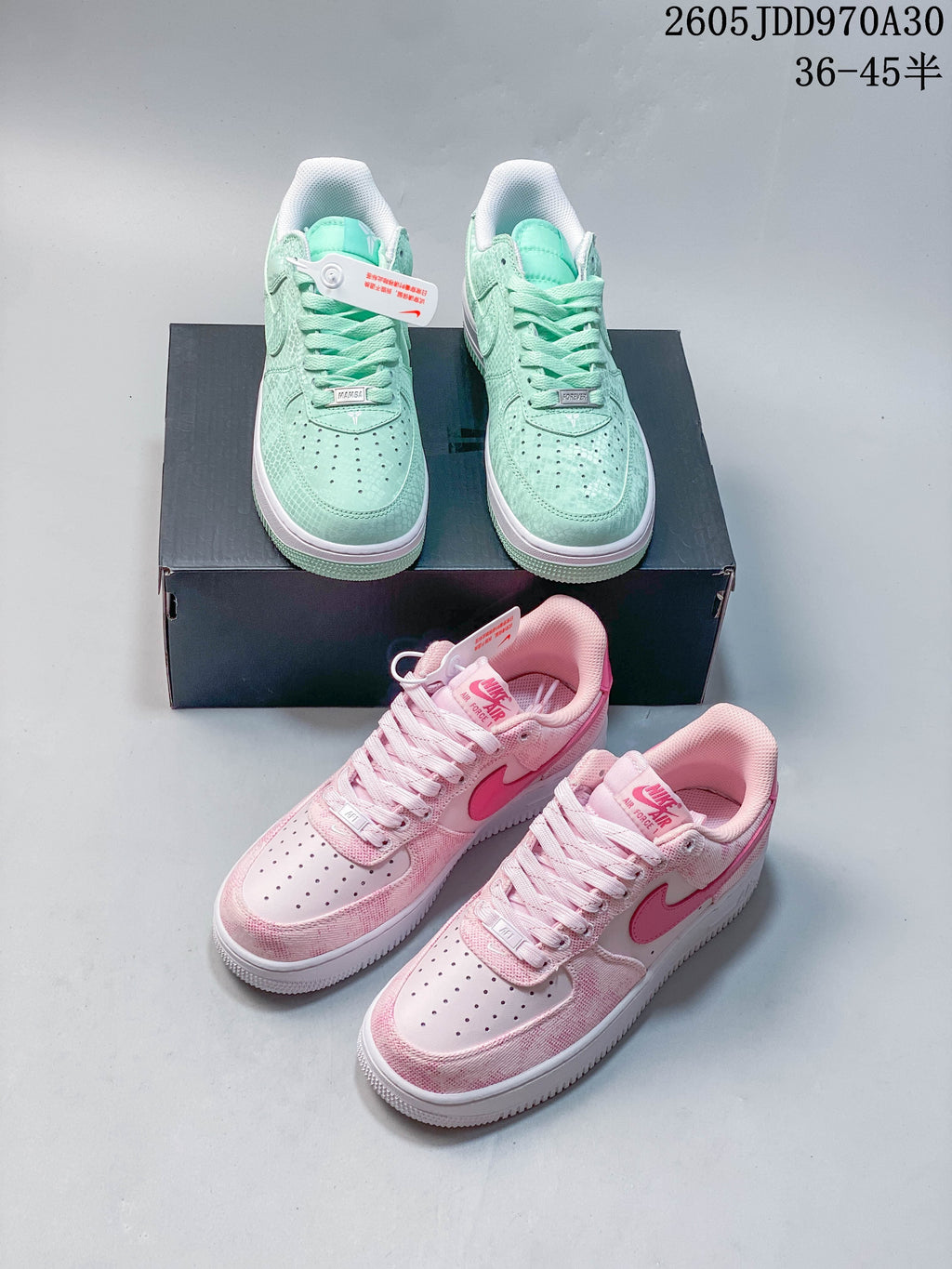 Pink and mint Nike Air Force 1 ’07 low-top sneakers shown together