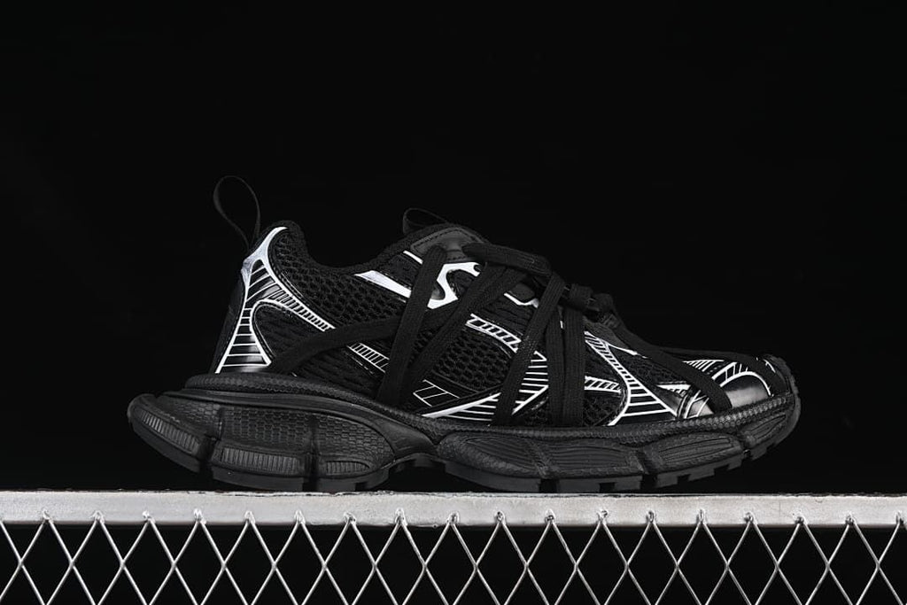 Side profile of the black and white sneaker.