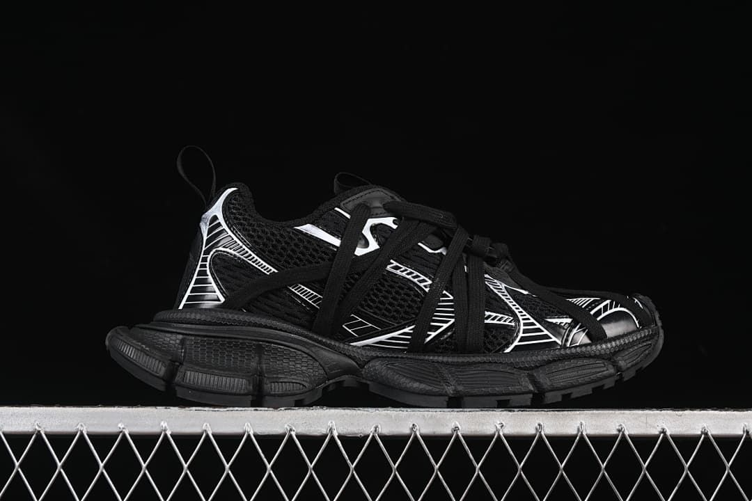 Side profile of the black and white sneaker.