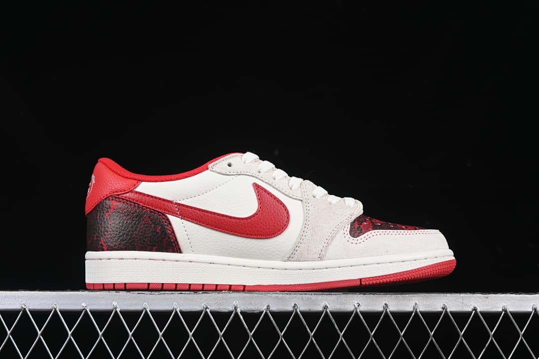 Side profile of a low-top sneaker with a red Swoosh and dark patterned heel.