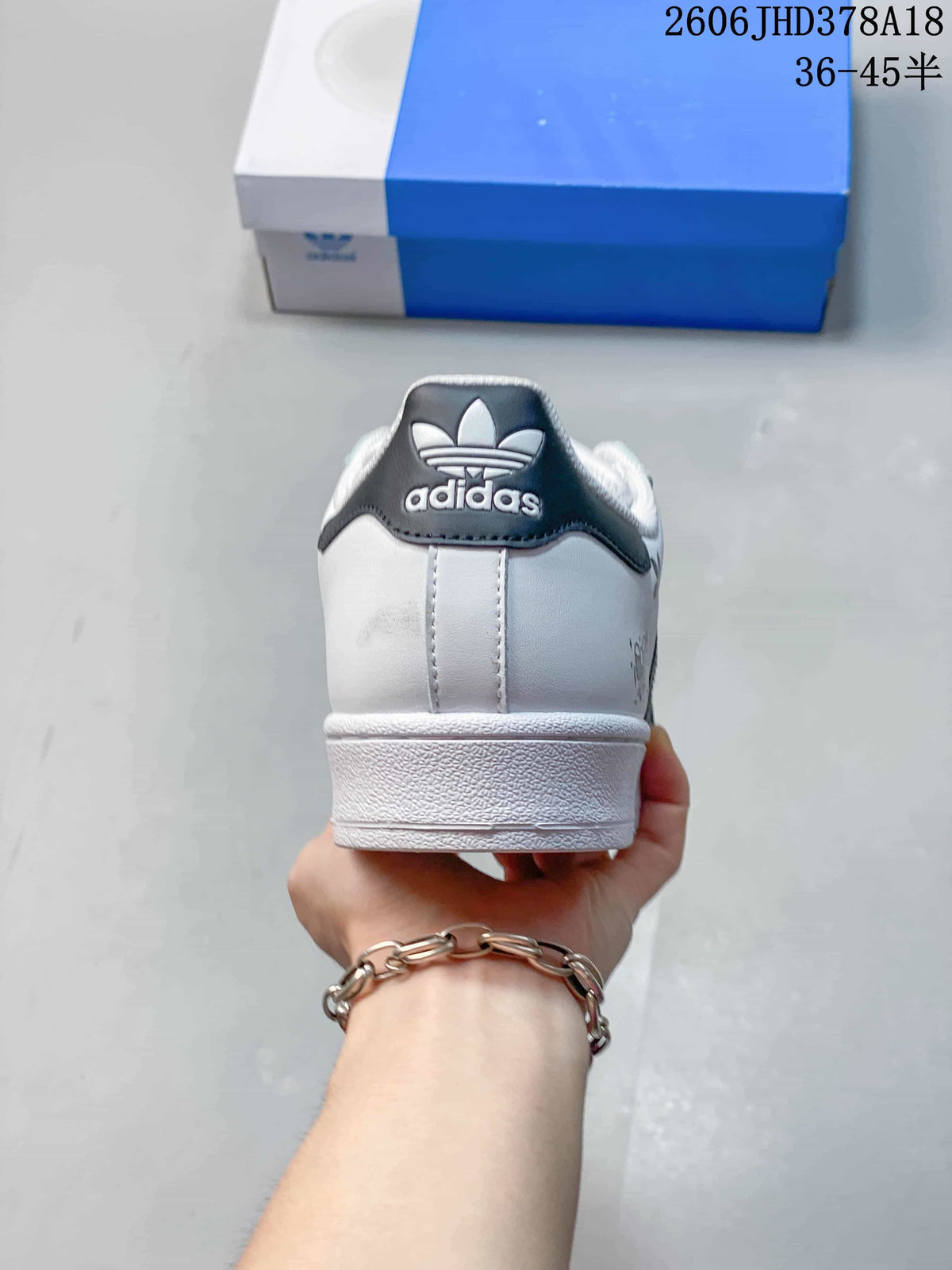 Rear view showing the black heel tab and white midsole