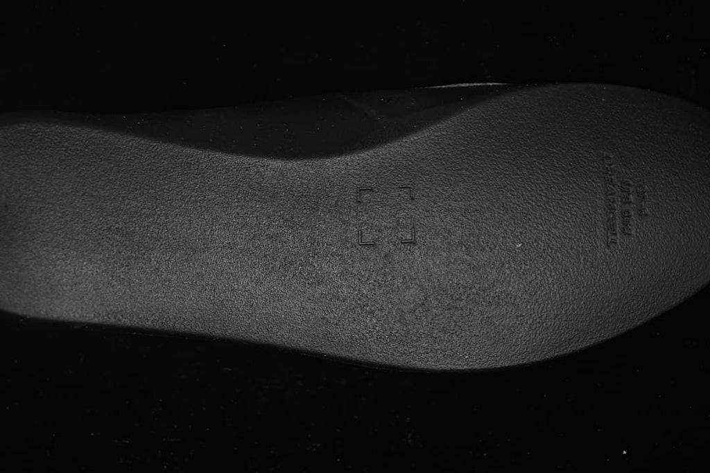 Close-up of the black textured outsole