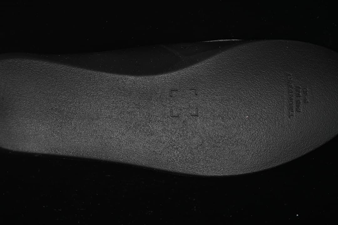 Close-up of the black textured outsole