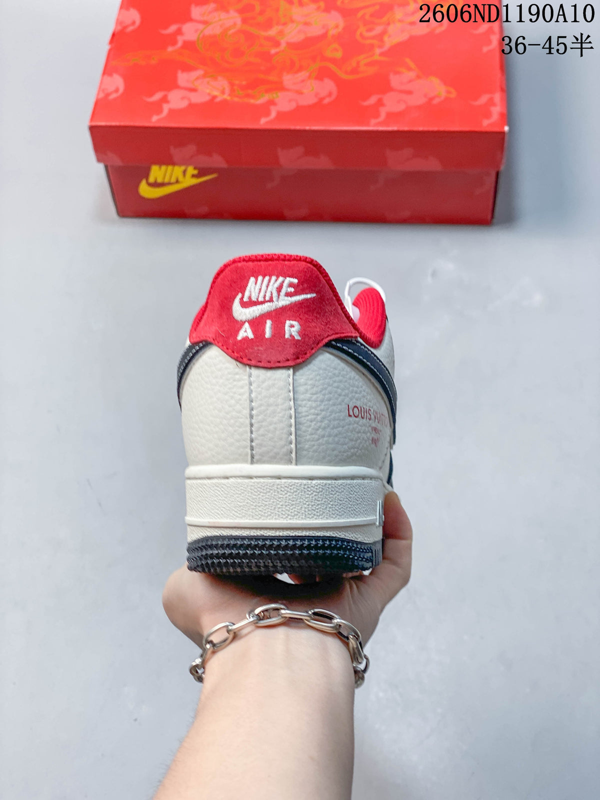 Rear view of the sneaker showing its red heel tab and white heel panel