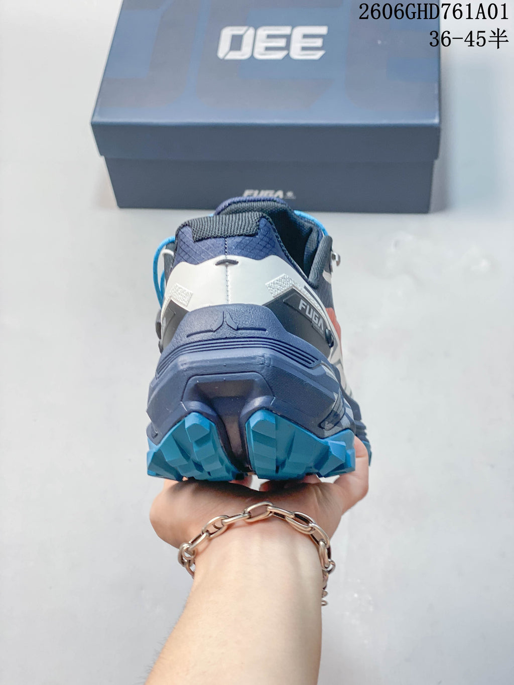 Rear view showing the heel and deep outsole lugs of a Kailas FUGA EX330 II trail shoe.