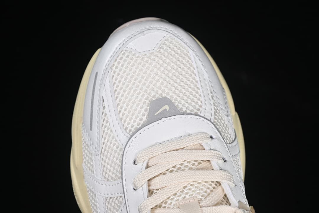 Top-front close-up of the mesh toe and lacing