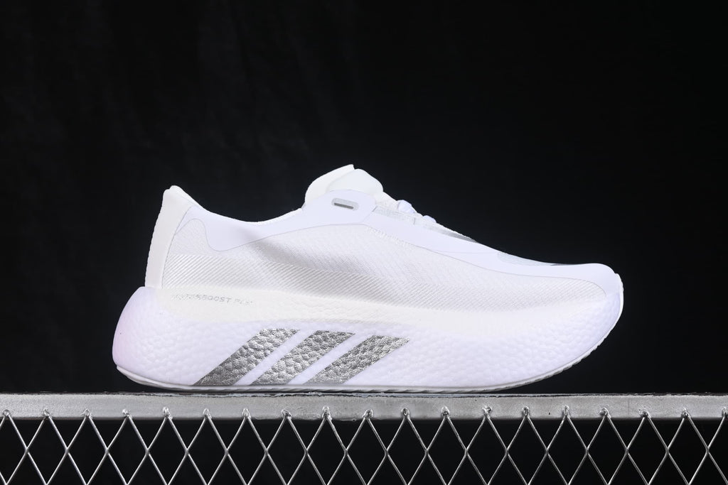 Opposite side view of the white Adidas HyperBoost Edge M shoe with silver branding and a raised sole.