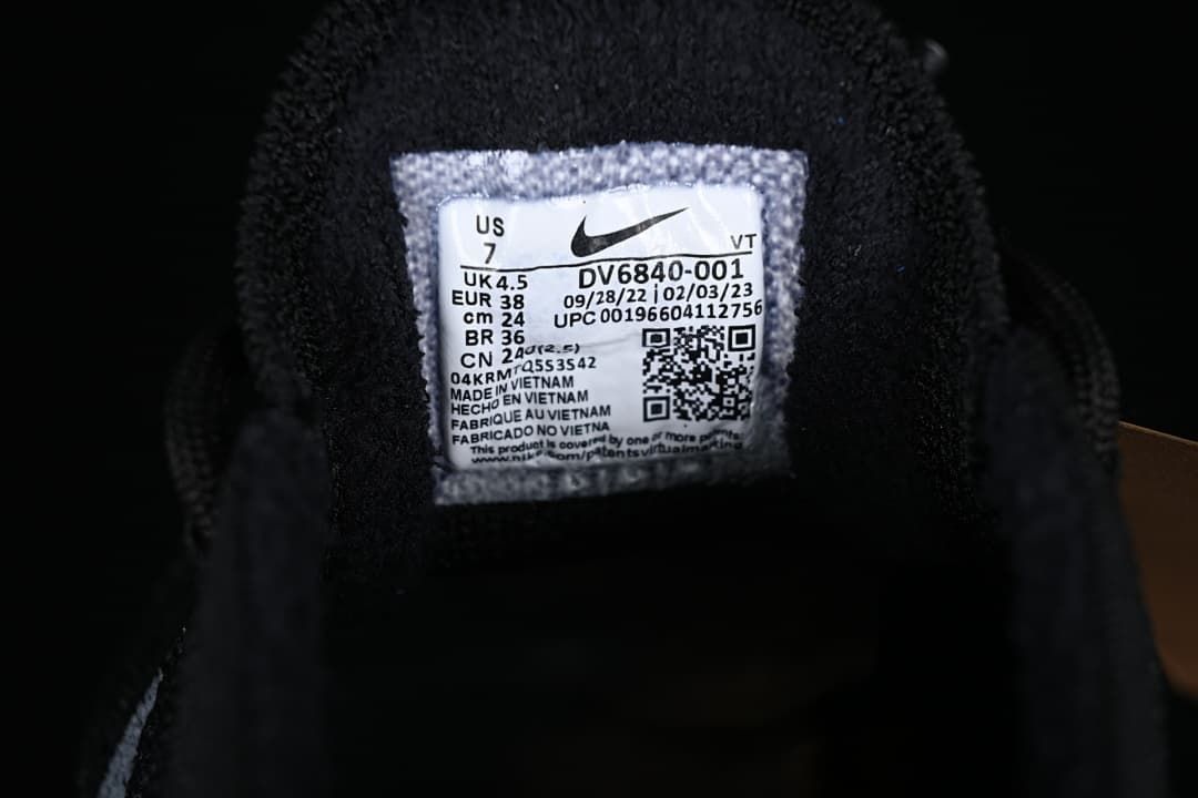 Close-up of the shoe size and style label showing EU 38 and DV6840-001