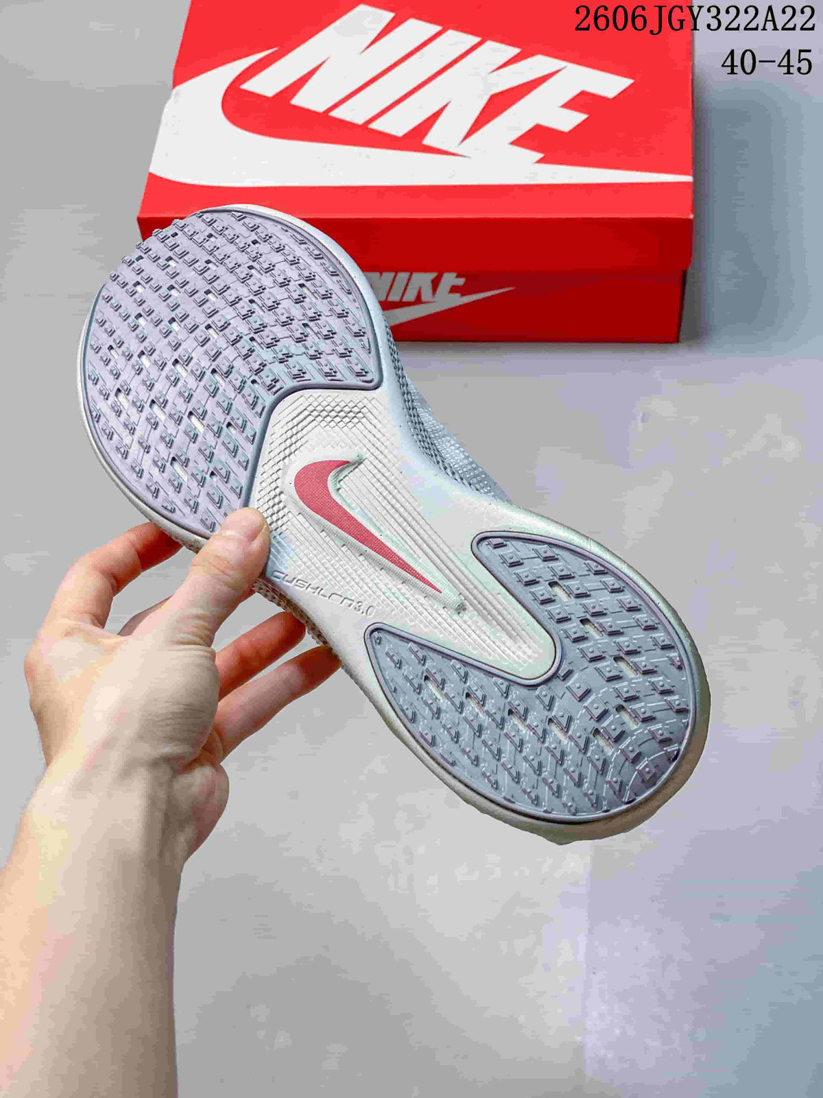 View of the patterned outsole on the white Nike Ava X sneaker.