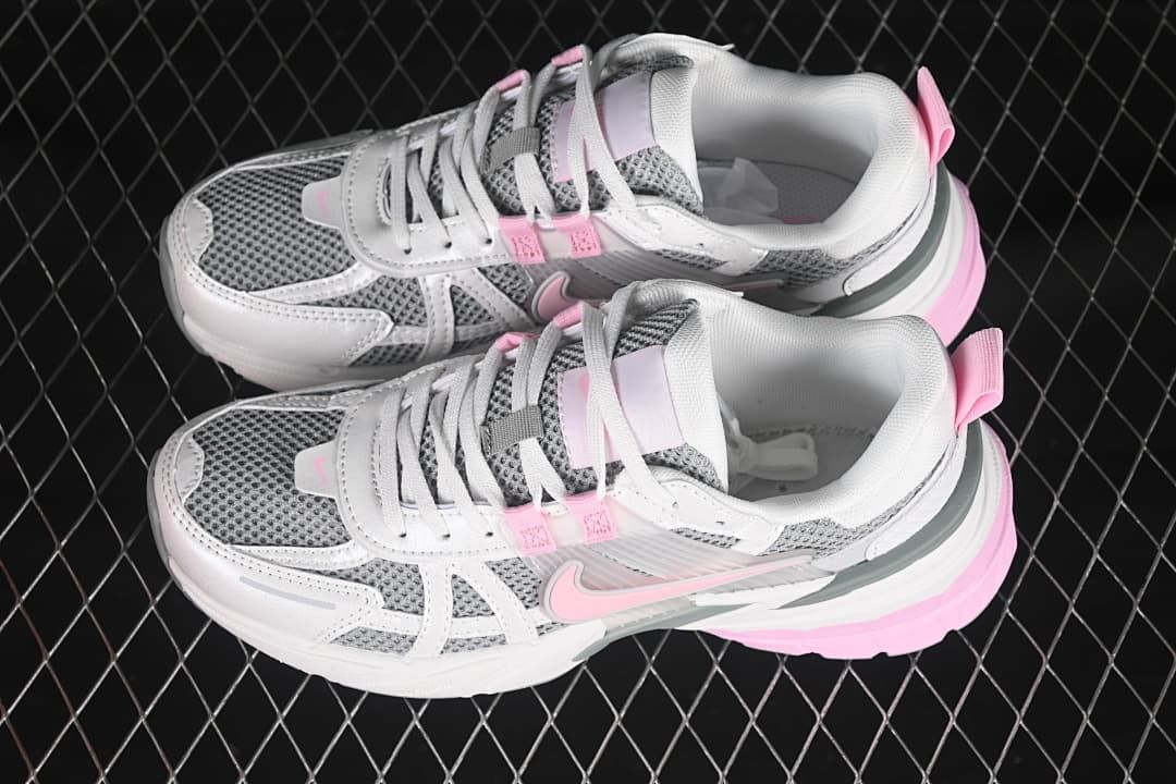 Pair of white, gray, and pink Nike V2K Run sneakers viewed from above