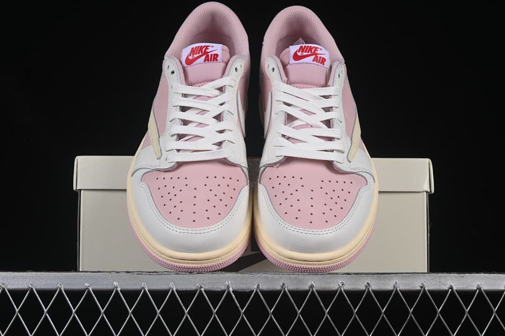 Front view of the pair showing pink toe boxes and white laces