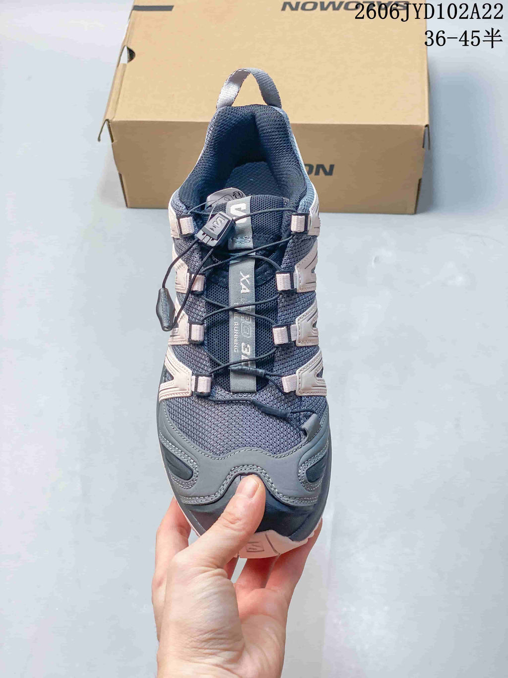 Top view showing the quick-lacing system and tongue of a Salomon shoe