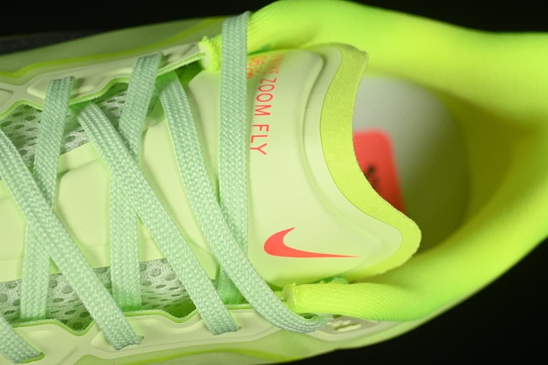 Close-up of the tongue, laces, and Zoom Fly branding.