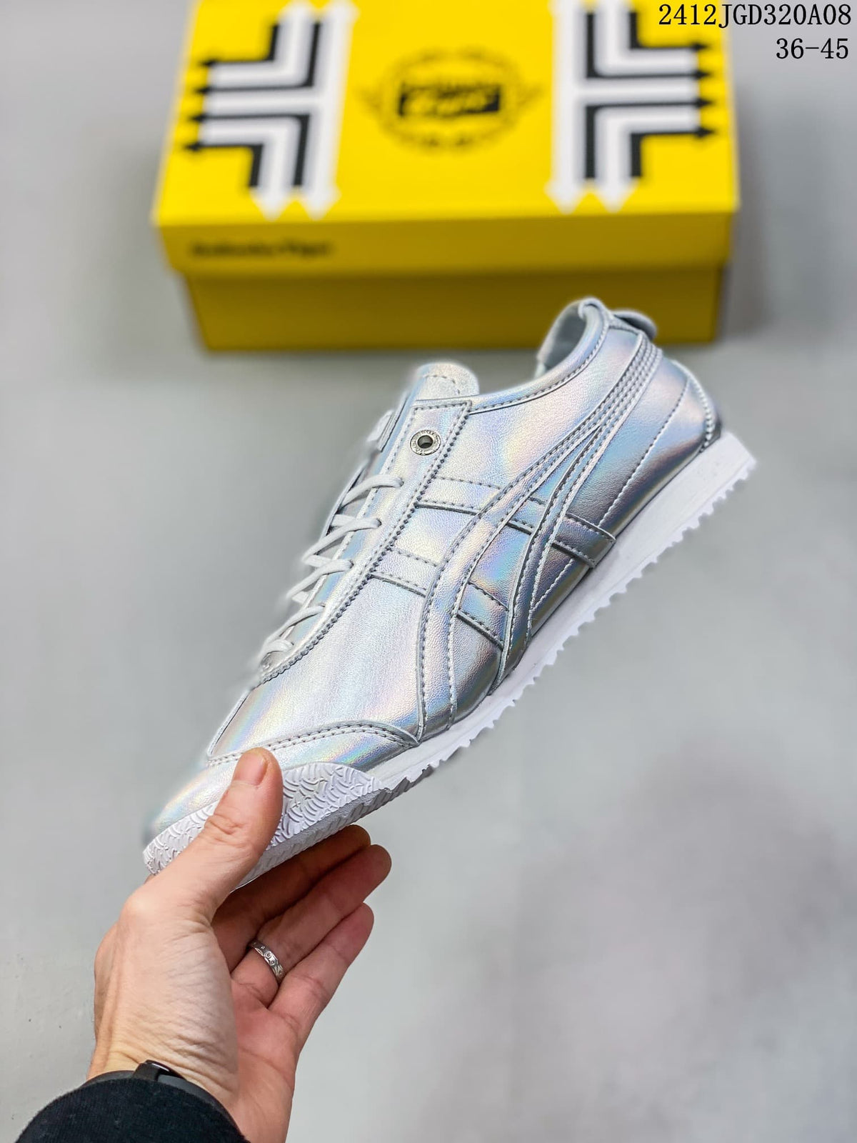 Side view of an iridescent silver low-top sneaker with signature stripes
