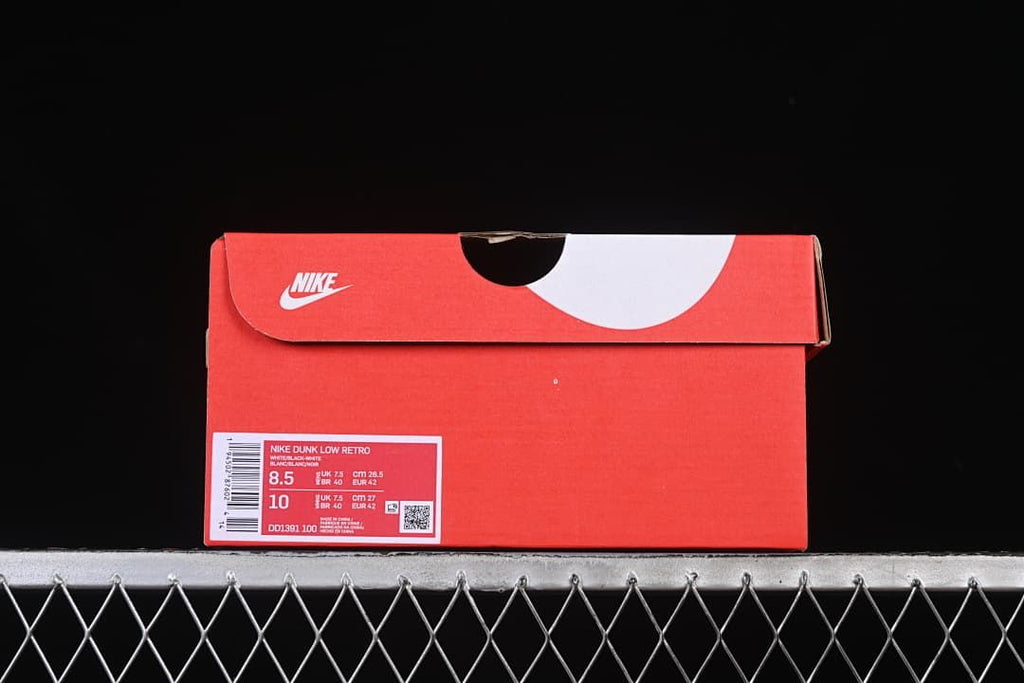 Red Nike shoe box with a size label showing a sample size