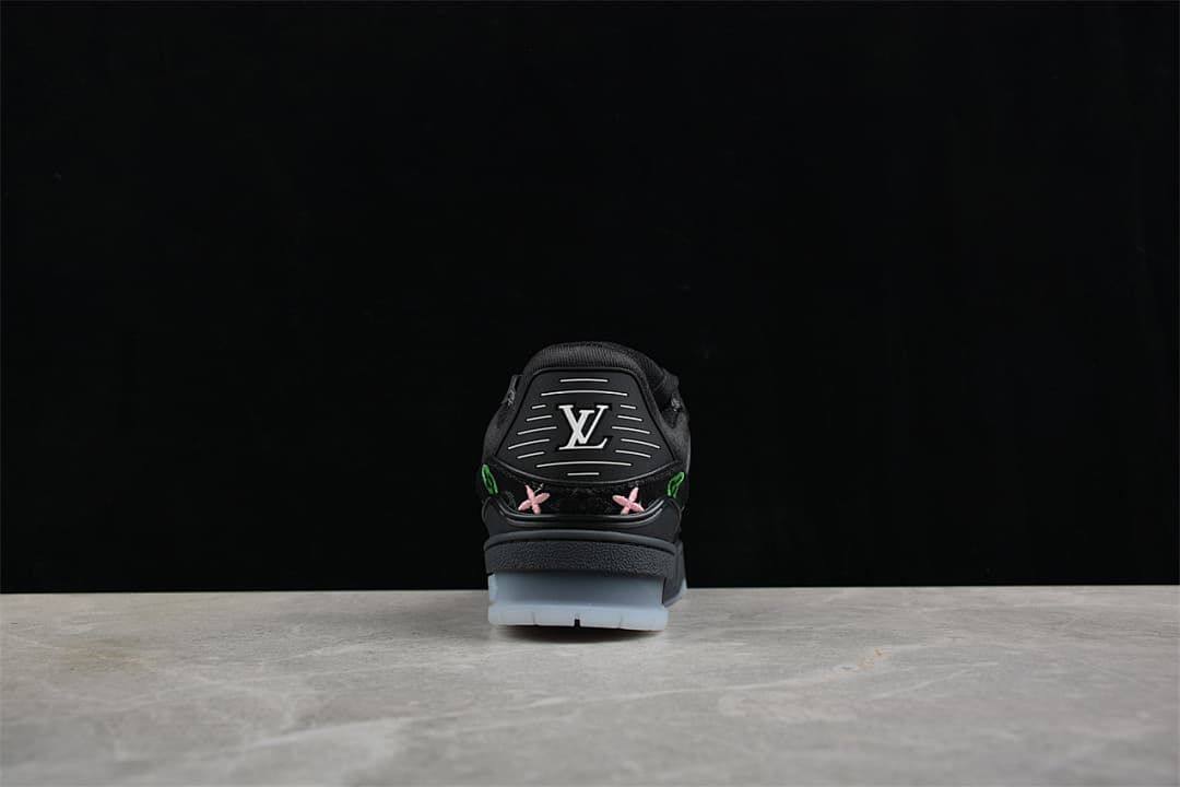 Rear view of the sneaker showing heel branding and translucent outsole