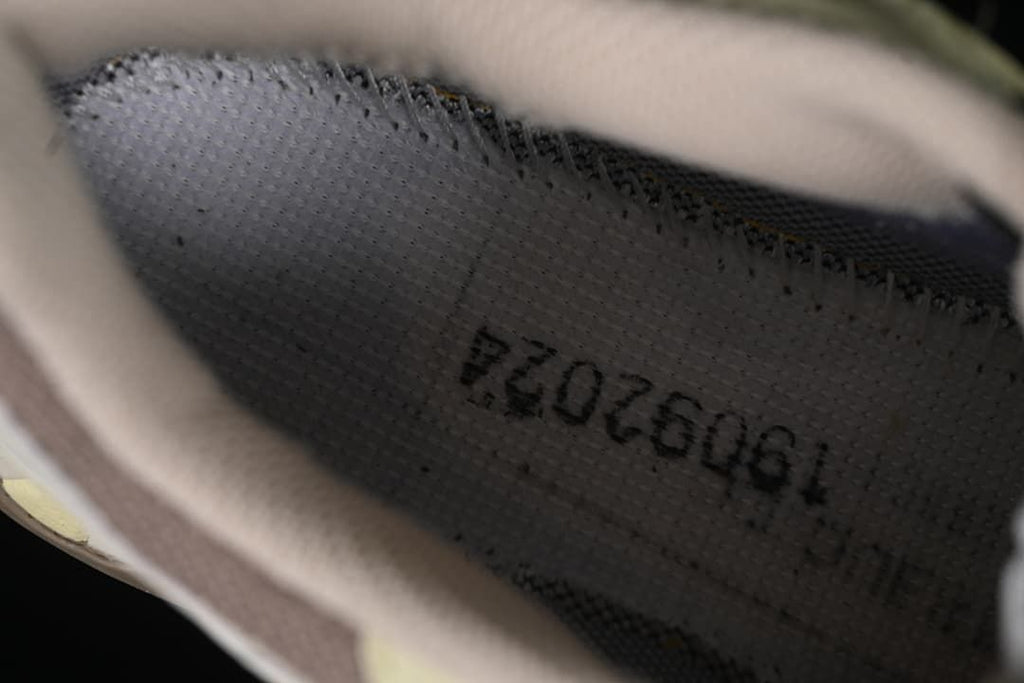 Close-up inside the shoe showing printed interior markings
