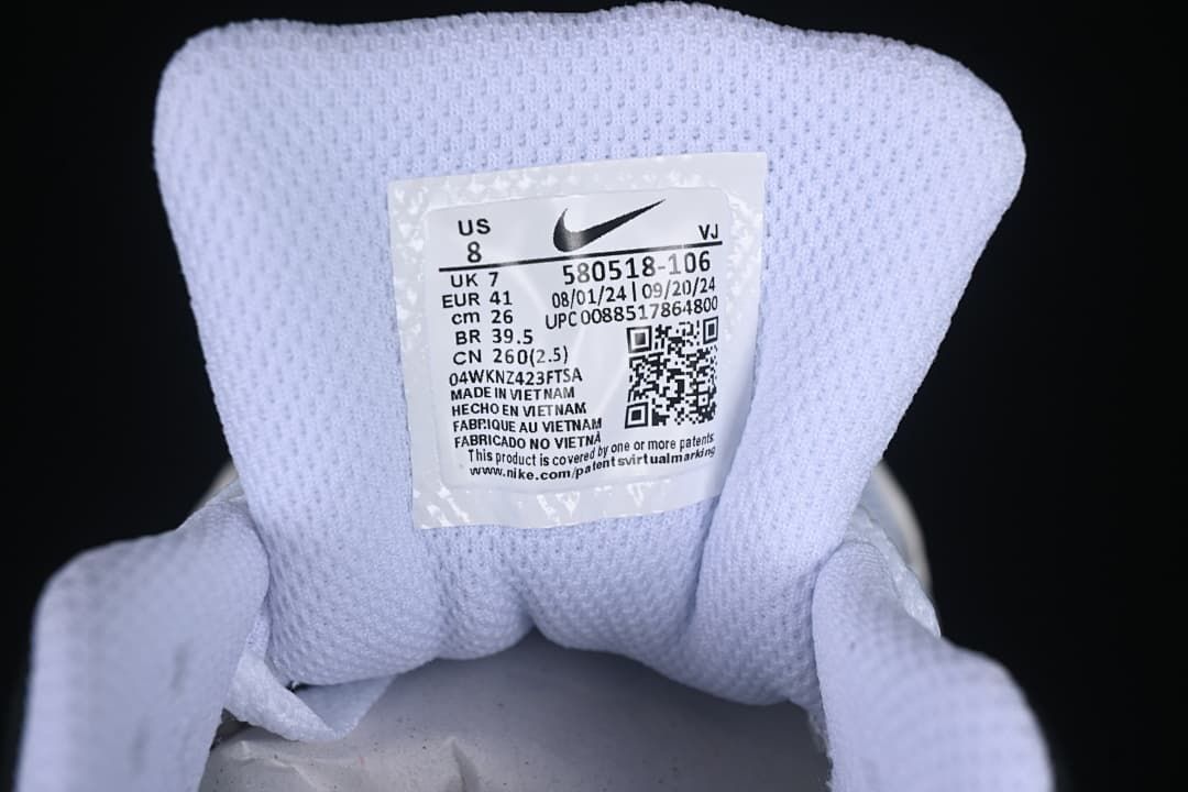 Tongue size label showing EU 41, US 8, and style code 580518-106.